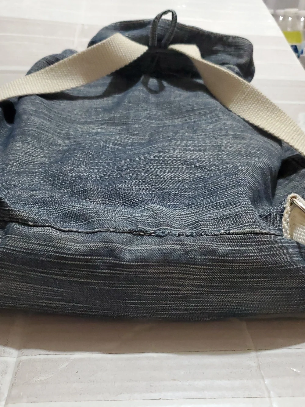 Denim-Look Drawstring Backpack with Cream Strap Details